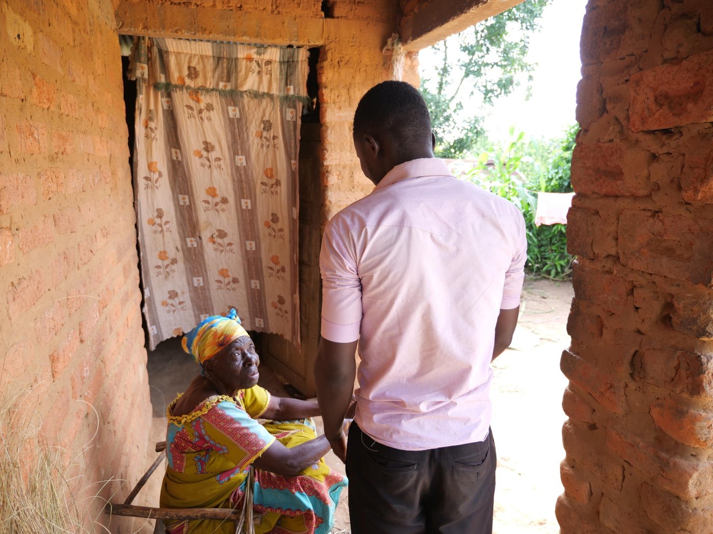 Mark* has a chat with his grandmother outside her house in Kananga, Kasai Central, DR Congo.
*Not real name
Photo: Itunu Kuku/NRC