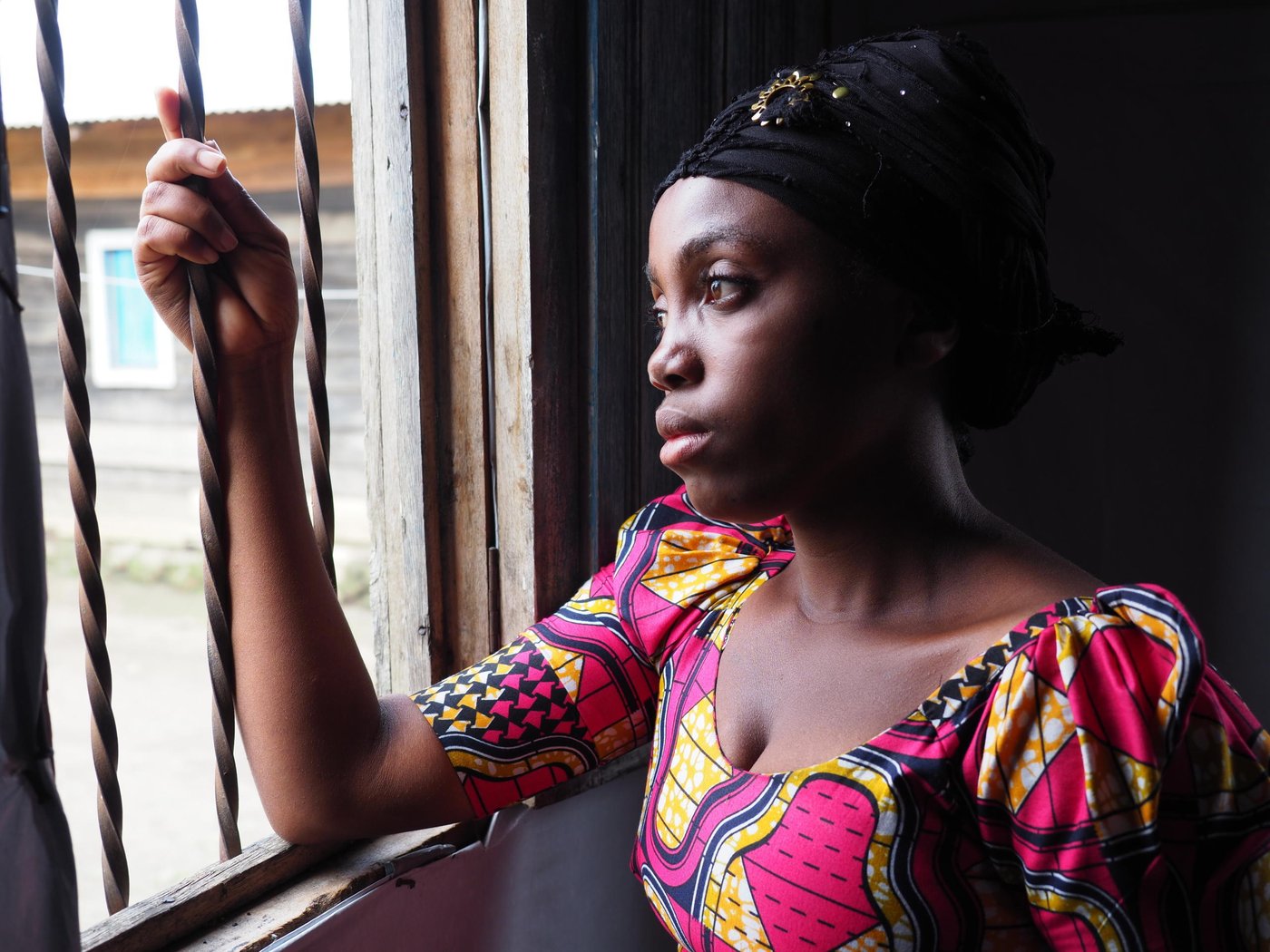 Rachel is twenty-years-old and lives with her parents, siblings and her 2-year-old daughter (name: Guylaine). She became pregnant when she was 17 with a boy from her village, but he disappeared when he revealed that she was expecting his child. Since August 2018, Rachel has been attending the NRC tailoring class in Kitchanga. These courses will last six months. After training, her dream is to start her own tailoring shop and to be able to give her daughter an education to in the future. She loves tailoring and she has made dresses for herself and her daughter. Before she was selected for the NRC tailoring class, she had nothing to do and now she is very happy to be able to attend the classes.
 
Rachel is from the village Ngingwe, Masisi territory, which is six kilometers from Kitchanga in the North Kivu province. She and her family had to flee during the night four years ago when the clashes broke out between armed groups. They travelled the whole night and reached Kitchanga in the morning. Rachel was very afraid when she had to flee and during this violence where she lost her grandmother and uncle. She misses them a lot. Rachel is still constantly afraid, and does not want to go back home until it’s safe. Since the attack, some people from the village have been back home to pick up food and their belongings, but they cannot sleep there, as the situation is still unsafe. Rachel has not been back home in Ngingwe since she and her family fled their home.
 
Rachel does not feel safe in Kitchanga either. She is scared that armed groups will enter Kitchanga and take over the town in the future. She does not feel well about being a displaced youth in Kitchanga. It is a big challenge for her because she is sometimes neglected. Since she also a single mother, people austersize her. 
 
There’s also a lack of food in Kitchanga, and Rachel does not have enough money to pay school fees, therefore she dropped out of school after second grade in secondary school. Rachel also struggles to pay for health care and clothes for her daughter. After tailoring class, she usually helps her mother to do some household activities, for instance, fetching water and cooking dinner. 
 
 Photo: Ingrid Prestetun/NRC