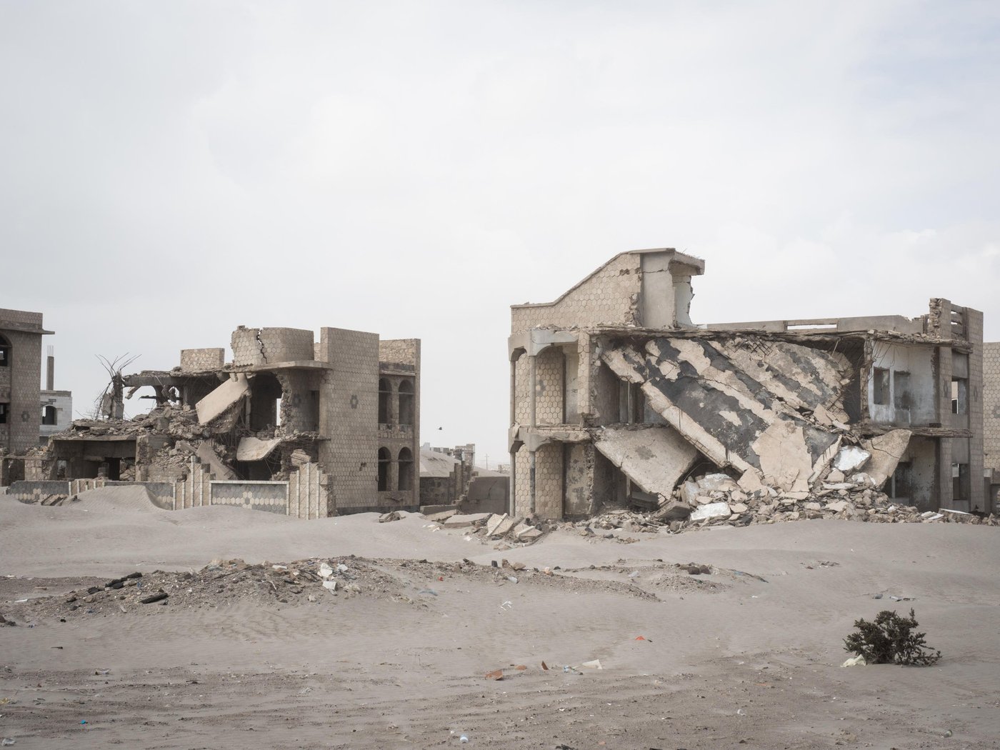Aden, Yemen.
Landmines, airstrikes, lack of food and medical help, the list of threats in Yemen putting thousands of lives at risk is long. And delivering aid is no easy mission. When driving a car in Yemen’s conflict-affected areas, even the sky above you and the very ground you’re driving on are possible threats. Fastening your seatbelt is minor compared to the many other precautions that have to be taken. All of the Norwegian Refugee Council’s cars have a large NRC logo on the rooftop, clearly visible from the sky, to reduce the risk of being hit by airstrikes. Drivers must always keep to the main road, or, when off road, follow the tracks made by other vehicles.
The reason is simple: on a regular basis, cars and people are blown to pieces by landmines or unexploded bombs buried in the sand.
Yemen is described as "the forgotten war" and "the world's worst crisis", but for over a hundred of NRC’s employees, the country represents more than gloomy headlines. It’s their home country, where they were born and raised, went to school and where they now go to work every single day, providing their fellow Yemenis with cash, safe water, shelter and education. Photo: Ingrid Prestetun/NRC