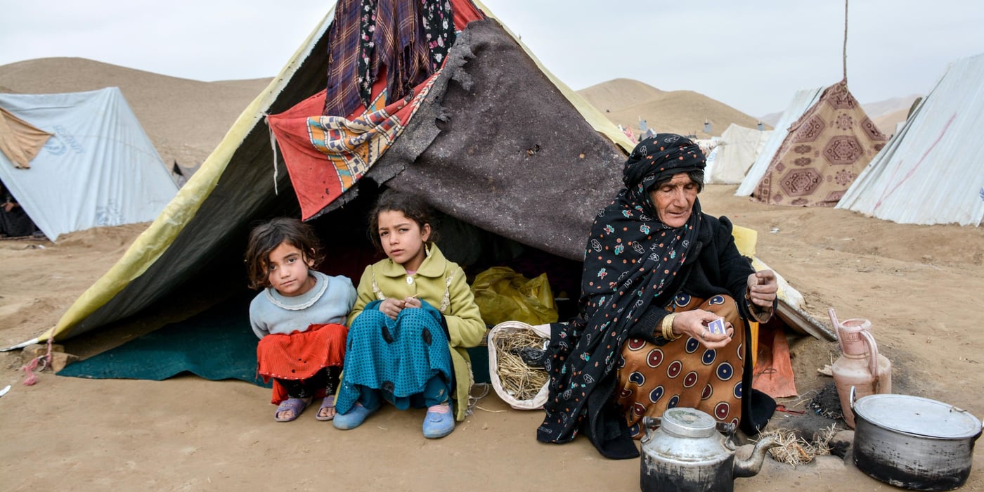 Gul Ghotay and her daughter Naseema and Naseema's friend Latifa in blue.
Gul Ghotay, a widow lives with her two daughters and a son in Feristan IDP settlement. Her husband died five year ago. Her oldest son is separated and living in Herat with his family. Her second son has become an opium addicts and she doesn’t know about his fate anymore. Zalmay, 17, her youngest son and her lost hope has been affected with Tuberculosis TB in the settlement. The family was living in substandard makeshift home in the river bed of Feristan settlement.
Though Zalmay is suffering from Tuberculosis, but he is the only breadwinner for his family of four. He has recently started selling sandwich in the market.
“we weren’t bothered by heat neither were we cold in our village. We are suffering all the time since we have been displaced. My son was healthy and now he coughs for hours or sometimes he brings out all his clothes and the other time he feels cold and asking me to put all the blankets over him. He acts weirdly and sometimes he doesn’t want to eat for days. The doctors say he has to eat plenty of fruits, vegetables and chicken meat, but the problem is that where can I get those all for him?”
“The doctors in Badghis told us to take him to Herat. We didn’t have enough to take him there. So I borrowed 10,000 AFN (Approx. $140) from my brother and took him there. The doctors give him some medicine and asked to visit them frequently. Now I don’t have enough to take him in Herat or buy him medicine."
Zalmay, 17, is infected with tuberculosis in Feristan IDP settlement where he and his family lived for over five months.
“I felt pain in the chest at the beginning and then was coughing. I didn’t tell my mom unless it got worst. I went to doctor and the doctors said I have been infected with tuberculosis. They gave me medicine for two months and asked me to visit them again. There have not been any changes or progress in my health. I still feel pain in my chest and coughing up blood.”
Photo: NRC/Enayatullah Azad