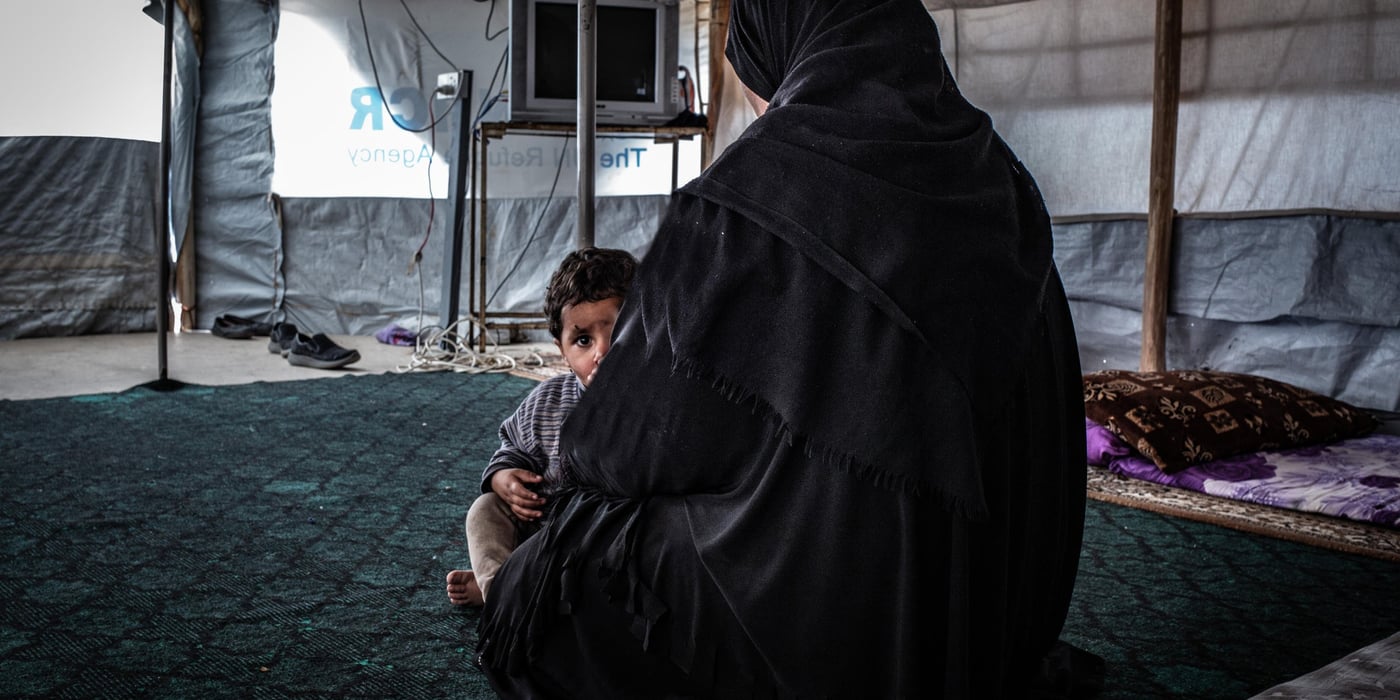 Hana, mother of seven children, fled Hawija in 2017 as the Iraqi government retook the city, one of the last remaining IS strongholds, to a displacement camp in Kirkuk governorate. Intelligence officials confiscated her civil documentation after she arrived in the camp. "My husband joined IS while the group was in control, but he died in an airstrike with my eldest son in 2017," she says.  Now she and her children are alone and unable to leave the camp, barred from attending school and denied access to healthcare and social welfare.

"My husband took the wrong path. He took my oldest son and left us to fight with Islamic State. They are both dead now, and I am alone in this camp with my young children. Three of them don't even have identity documents (ID). My husband destroyed our lives, me and my children suffer," the widow says.
	
Her three children born under IS rule do not possess birth certificates and, as a result, cannot obtain IDs. She says during the winter, her children got sick from the cold but was unable to take them to a hospital outside the camp. 

She tried to seek assistance from a lawyer working with a humanitarian organization to start the procedure to formally divorce her husband and try get her ID back and obtain documents for her children, but they said they were unable to assist because of accusations of IS affiliation. She says the humanitarian assistance she receives is limited because priority is given to those can provide identification. 

* Name was changed for protection concerns.
Photo : Tom Peyre-Costa/NRC
