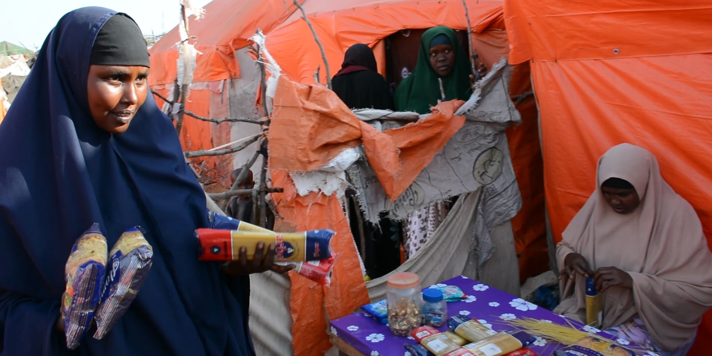 Asha Hussein is a mother of four children, aged between four and ten years. She is 35 years old. She has spent the last eight months living in the outskirts of Mogadishu. She used to live in Kontuwarey in the Lower Shabelle Region as an agro-pastoralist, cultivating a one-hectare farm as well as keeping domestic animals. But the drought took away all her animals, 15 cows and 20 goats. They all died from starvation. Her crops dried up and died. Water became scarce. Boreholes and wells dried up. All her survival options dwindled. She is no longer with her husband, and she could not stay in the village any longer. 
In Mogadishu, she lives in a tent house and survives on a cash program that enables her to afford basic necessities from the local market. In Mogadishu, spaghetti is a common food. Somalis have a common past with the old Italian colonial administration. Asha's children enjoy spaghetti. She spends most of her food budget on spaghetti and meat products.   Photo: NRC/Nashon Tado