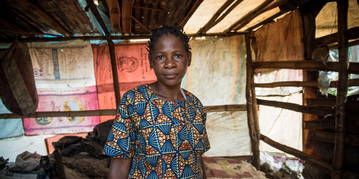 Minette (38) and her family fled from Manyu and sought safety in Buea after their home was burned down. They have received some plastic sheeting and utensils from NRC, and they have built a temporary kitchen at their new place in Buea.

Photo: NRC/Tiril Skarstein