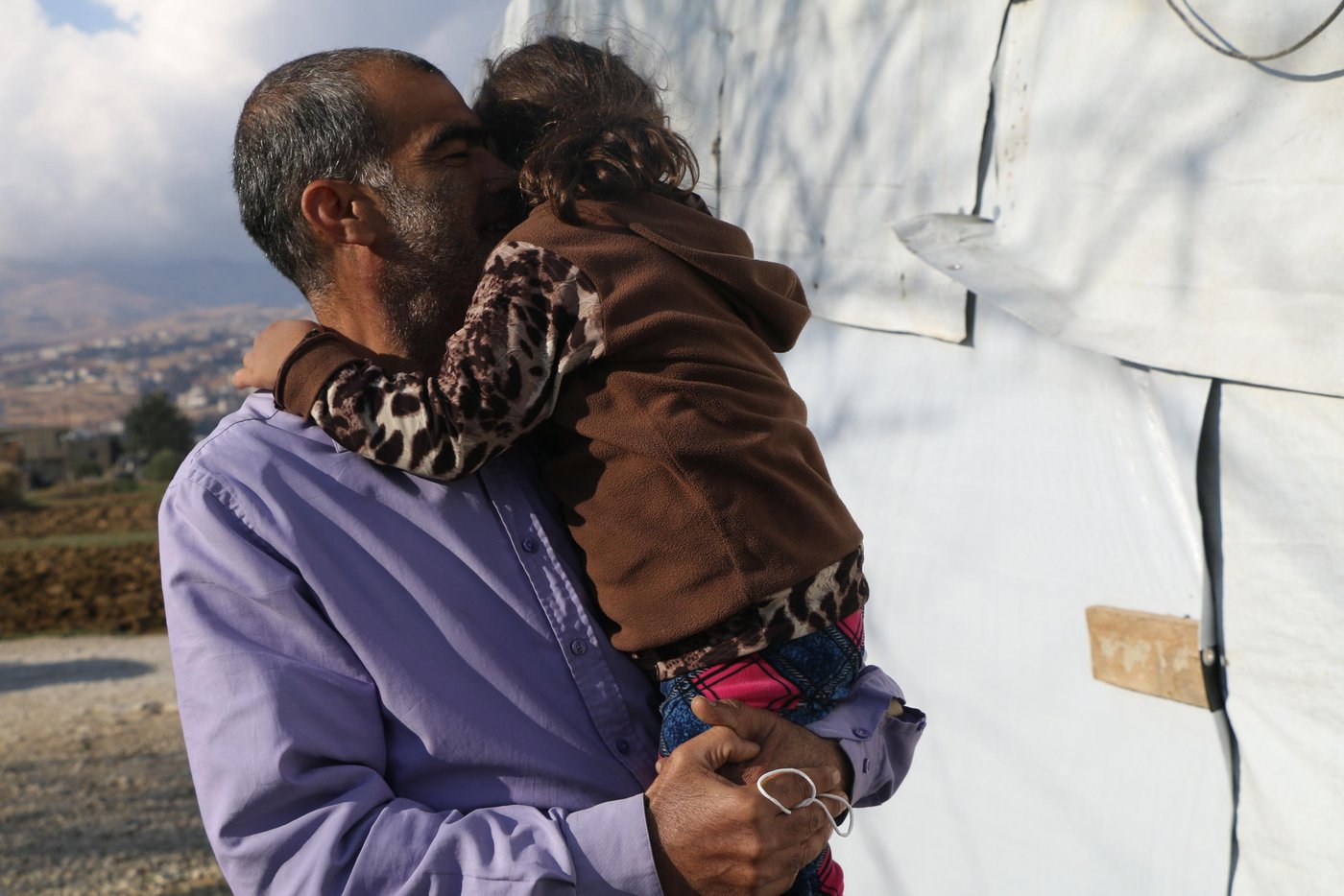 Their family fled to Lebanon from their homes in Syria after being caught up in the war there, in 2013.
They moved into their current tent in 2006.Thanks to wood supplied by NRC, the family have been able to double the size of their home since they first bought it from its previous tenant. NRC also supplied and maintains toilets in their settlement, supplies water for drinking and washing, hygiene kits and waterproofing materials.
Photo: Zaynab Mayladan/NRC