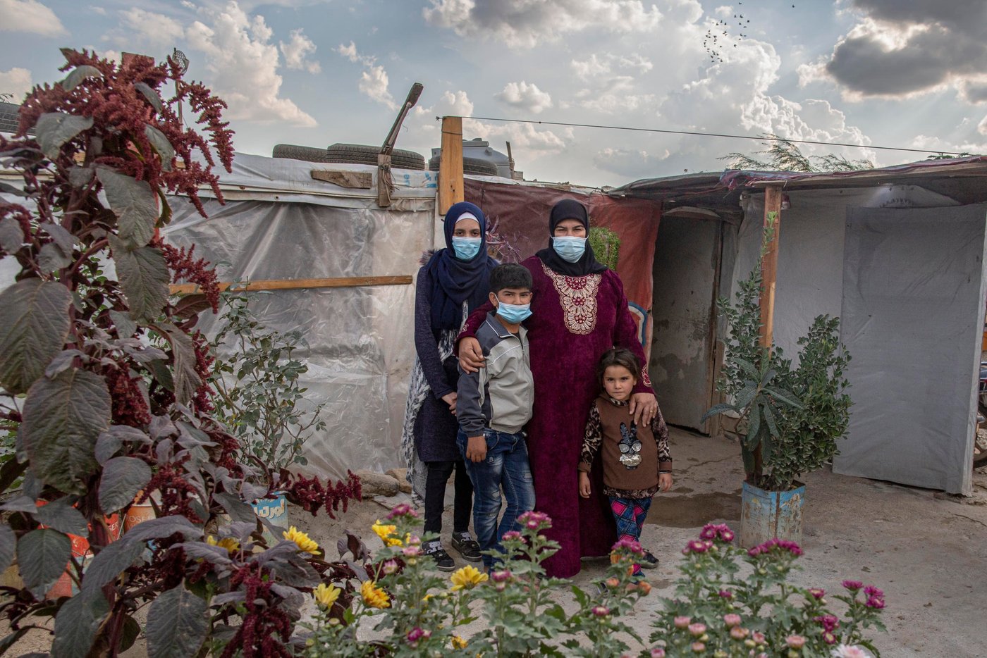 Their family fled to Lebanon from their homes in Syria after being caught up in the war there, in 2013.
They moved into their current tent in 2006.Thanks to wood supplied by NRC, the family have been able to double the size of their home since they first bought it from its previous tenant. NRC also supplied and maintains toilets in their settlement, supplies water for drinking and washing, hygiene kits and waterproofing materials.
_____________________
Photo: Sam Tarling/NRC