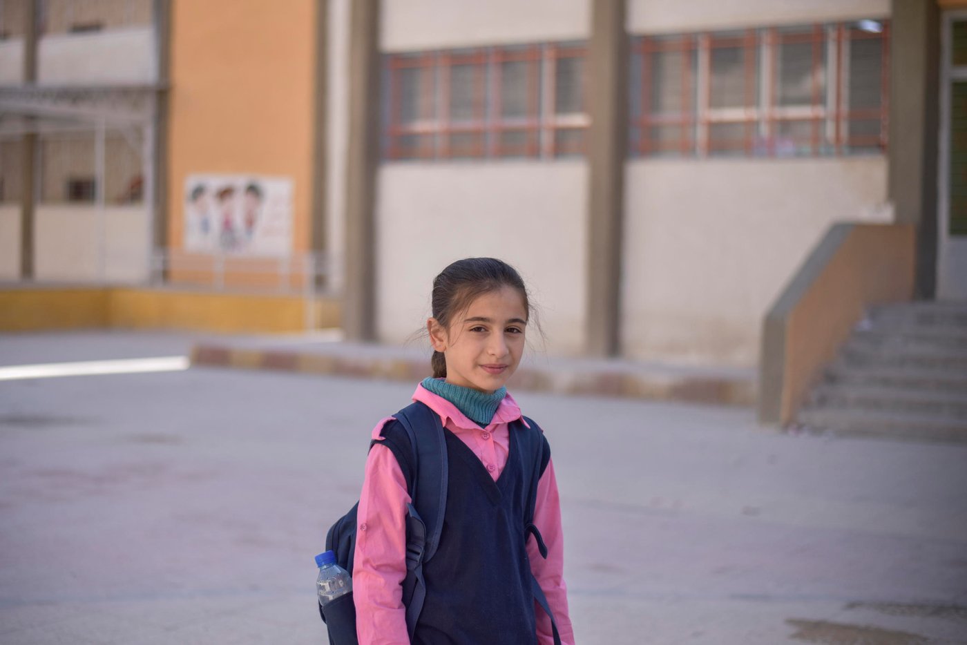 [Tala]* 10 years old elementary student:
“Last year our school was damaged; the windows were broken, it’s yard wasn’t as pretty as now, it lacked all these walls with the beautiful drawings on them, even the desks we sat on were broken. This year everything is much better, the school is so pretty and the teachers are very helpful and we are participating in more physical/sportive activates, even my grades in the exam we took are better”

Photo: Tareq Mnadili/NRC
