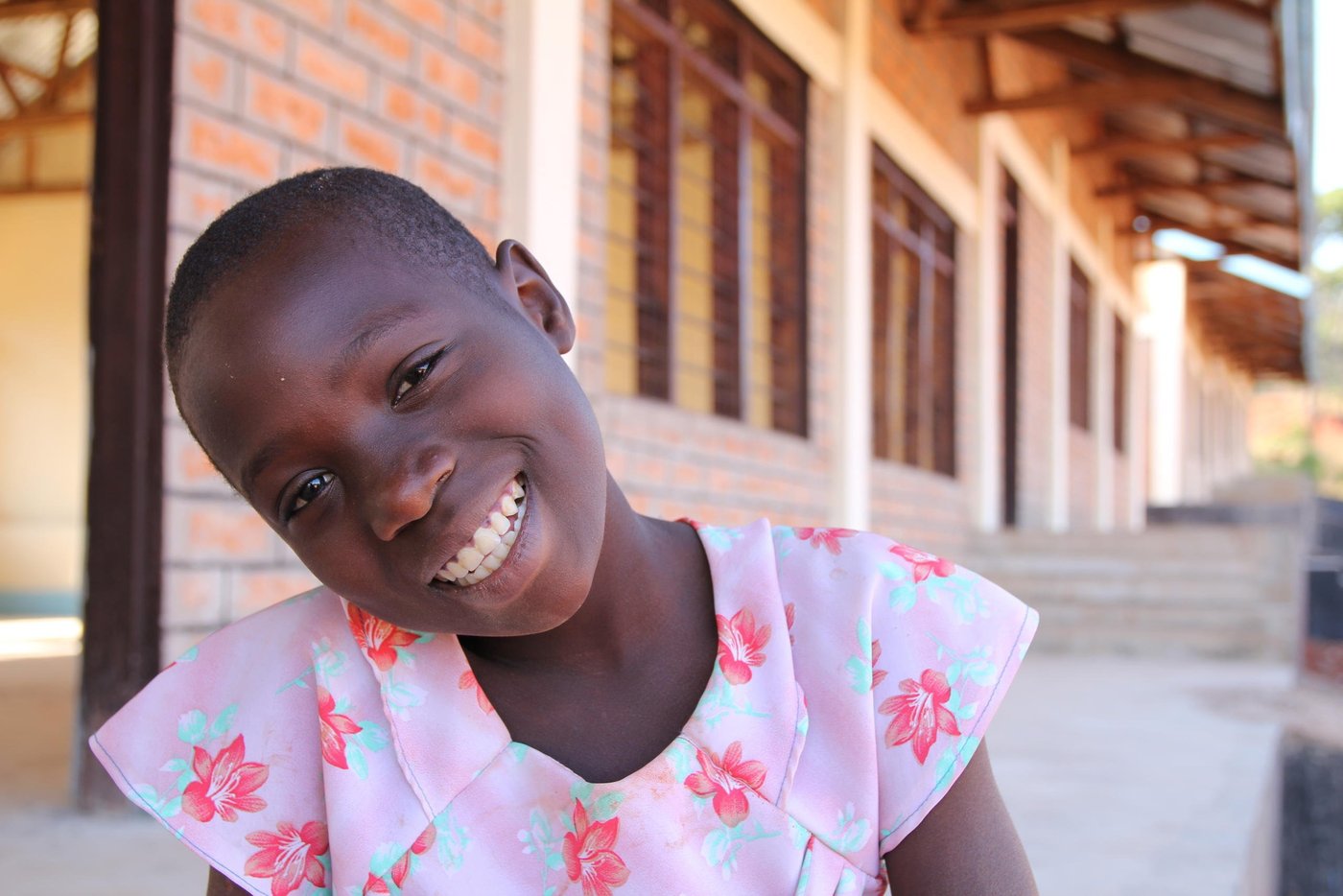 Diane (10), left Burundi while in Class Three at Kumwumi Primary School. However, while at Mtendeli refugee camp in Tanzania, Diane has not been able to resume school. She lacks the basic learning materials. “I do not have clothes, shoes, books, pen, ruler and a school bag,” she says. 
However, Diane is excited about the prospect of returning to class. She is one of the pupils who will start schooling at the primary school being constructed by NRC in Mtendeli.

Diane quotes (from June 2017 interview):

“In Burundi, I liked to study. I had materials: clothes, shoes, exercise books, rubber, pencil, mathematical set, pen, shoes and body lotion.”
“We had a charming teacher who made us laugh. The school was built well and I had a friend.”
“In Burundi, I had a friend. I miss my father. I miss my friend. I miss my teacher who made us laugh. I miss my home.”
“What made us flee was political warfare. People were killed, taken at night, we could not know where they had taken them. Even my father, they took him at night.”
“In Burundi because there was a selective war, I stopped school for one year. I see they are building schools here. I pray that I also study here.”
“In Burundi, I likes Mathematics, Kirundi. I want to teach. I want to become a teacher too.”
“At school in Burundi, I likes Mathematics, Kirundi. I want to study. I want to become a teacher too.”
“In school, I likes Mathematics, I liked Kirundi, I wanted to study very hard so that I become a teacher too.”	
“I see they are building the school there. I am happy because they are building. I will also go to study there to get knowledge.”
“I am hoping I will also be taken to study at that school.”
“I am happy because I see they are building the school and I have been selected to study from that school.”
“Thank you for listening to my story.”
“I hope I will get teachers who will make me laugh like those that I had in Burundi. I hope I will get friends as those I had in Burundi.”
Lyrics of her song: “When Petro was still young, he saw other children going to school, he escorted them. On the way he turned back, while very sad, then he told his parents, to bring him to school. When he started school, he did not delay to finish, and now he succeeded, he is teaching other pupils. He is teaching other pupils.”

Photo: NRC/Ingrid Prestetun