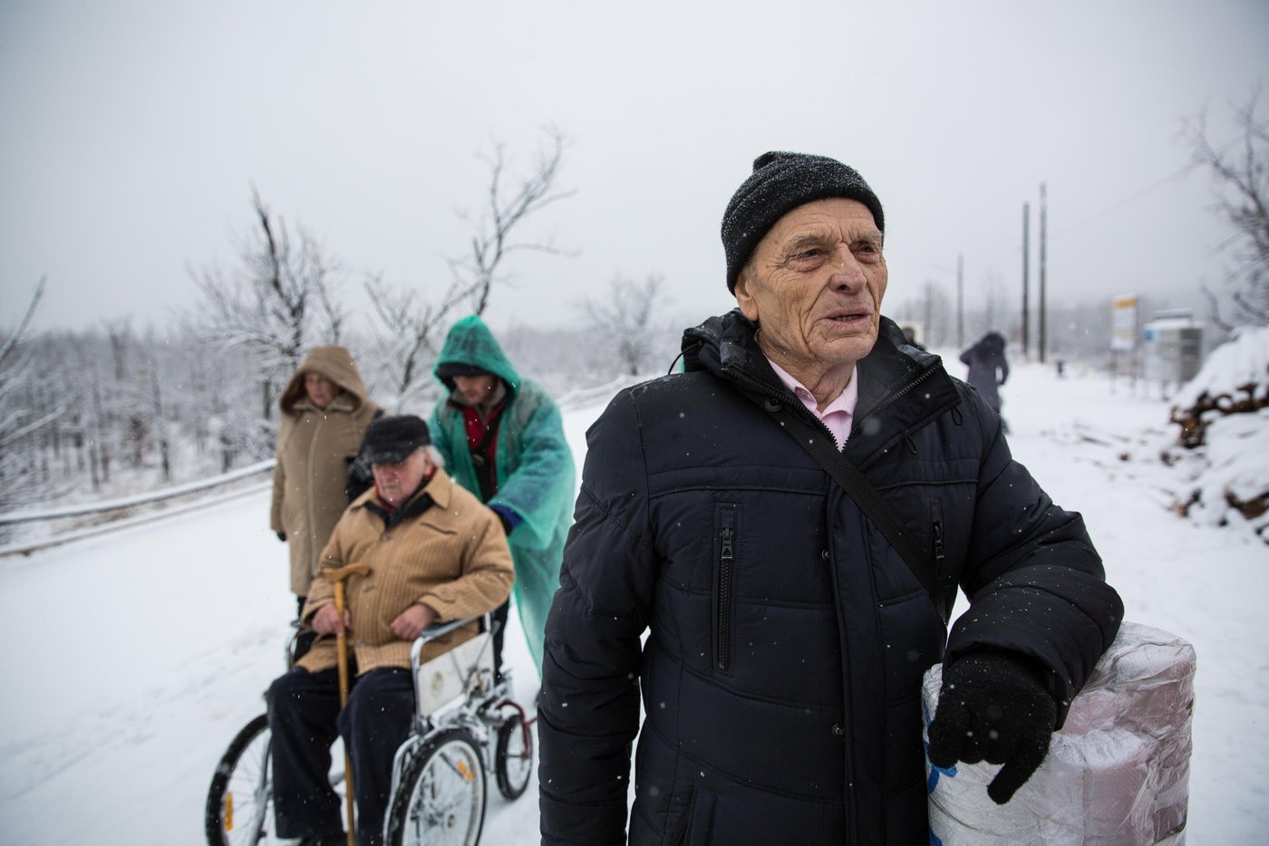 Mykola is 65. He is a pensioner from Pervomaisk in Luhansk region, now in the non-government controlled area (NGCA). He travelled from Zolote town with his wife already at 3 o'clock in the morning in order to have time to arrive at the EECP by the opening and as soon as possible move on to NGCA and get home. Mykola and his wife had waited for their turn to check their documents for about two hours.

“It has become quieter. There is less shelling. It is possible to live. But sometimes it is very scary. Children and grandchildren are far away. They are trying to arrange their lives in a new place. And we survive as we can”, says Mykola. 

Photo: Ingebjørg Kårstad/NRC