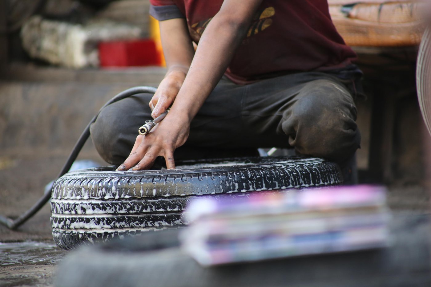 Ahmed (not his real name), a 13 years-old boy, goes to school every morning and works as a mechanic in the afternoon and during weekends with his father. The money he earns helps his father pay for his education.
Photo: Khalid Al-Banna / Norwegian Refugee Council