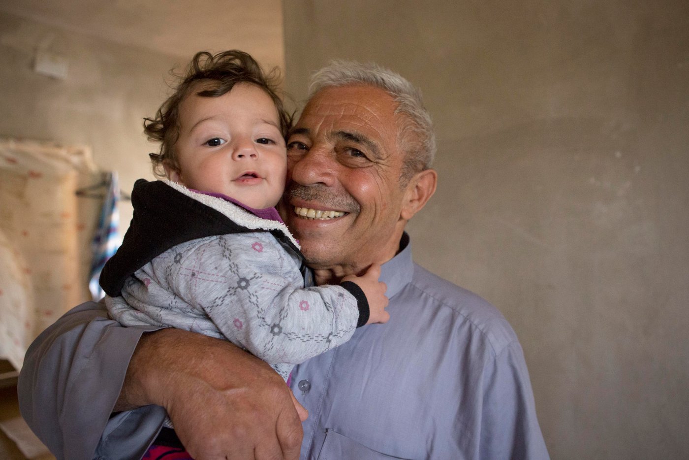 Some of the family neighbours knew about NRC shelter program and passed on the organization hotline contact number to the family. From there, the family became part of the unfinished house project.
Ramtha
July 2018
Photo by: Oriane van den Broeck/NRC