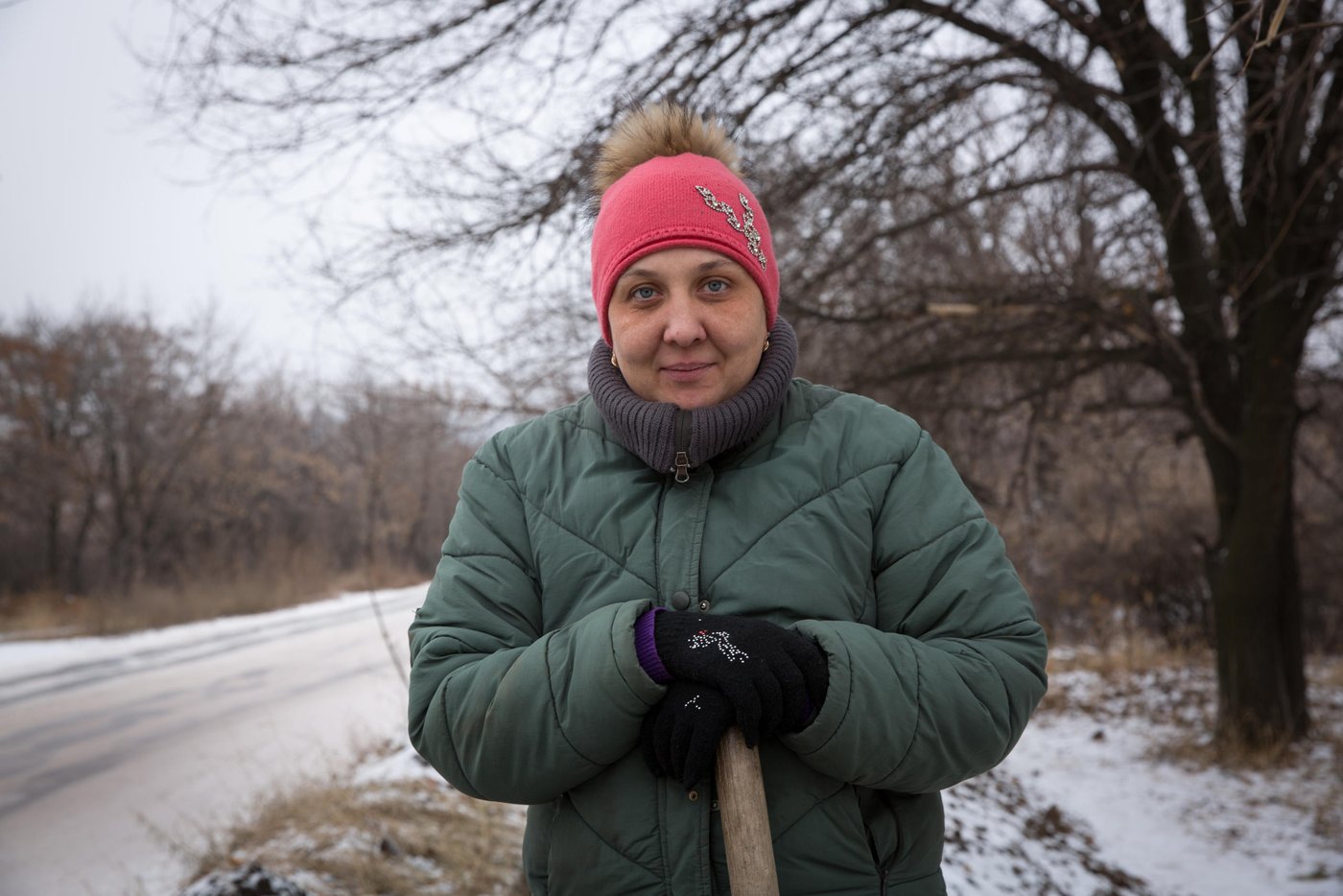Aliona Neplia, 36, is the only breadwinner for her 4 children in the frontline town of Hirske, Popasna district. Aliona is unemployed, and the only income for this family is a modest social benefit.
“When the hostilities started in my town we did not leave, because we have nowhere to go, and there is nobody to help us. My four-year old child is in wheelchair due to severe form of cerebral paralysis and needs special care”, says Aliona.
“From the social benefit I get, I can only afford to pay for electricity. I have very big debts on water and heating supply, as I need to make a choice, whether to buy medications for my sick child or to pay for utilities. Every day I go to the shop and buy food in debt. When I receive social benefits I pay it, and I make new borrowings again and again. This is how we live”.
Aliona tries to catch any opportunity to work. She actively participates in the NRC community infrastructure projects, this year she helps to repair worn-out water supply system at one of the town streets. During the project, which lasts four months, NRC supports her with monthly cash assistance for food, which is crucial for her family.
Photo: Ingebjørg Kårstad/NRC