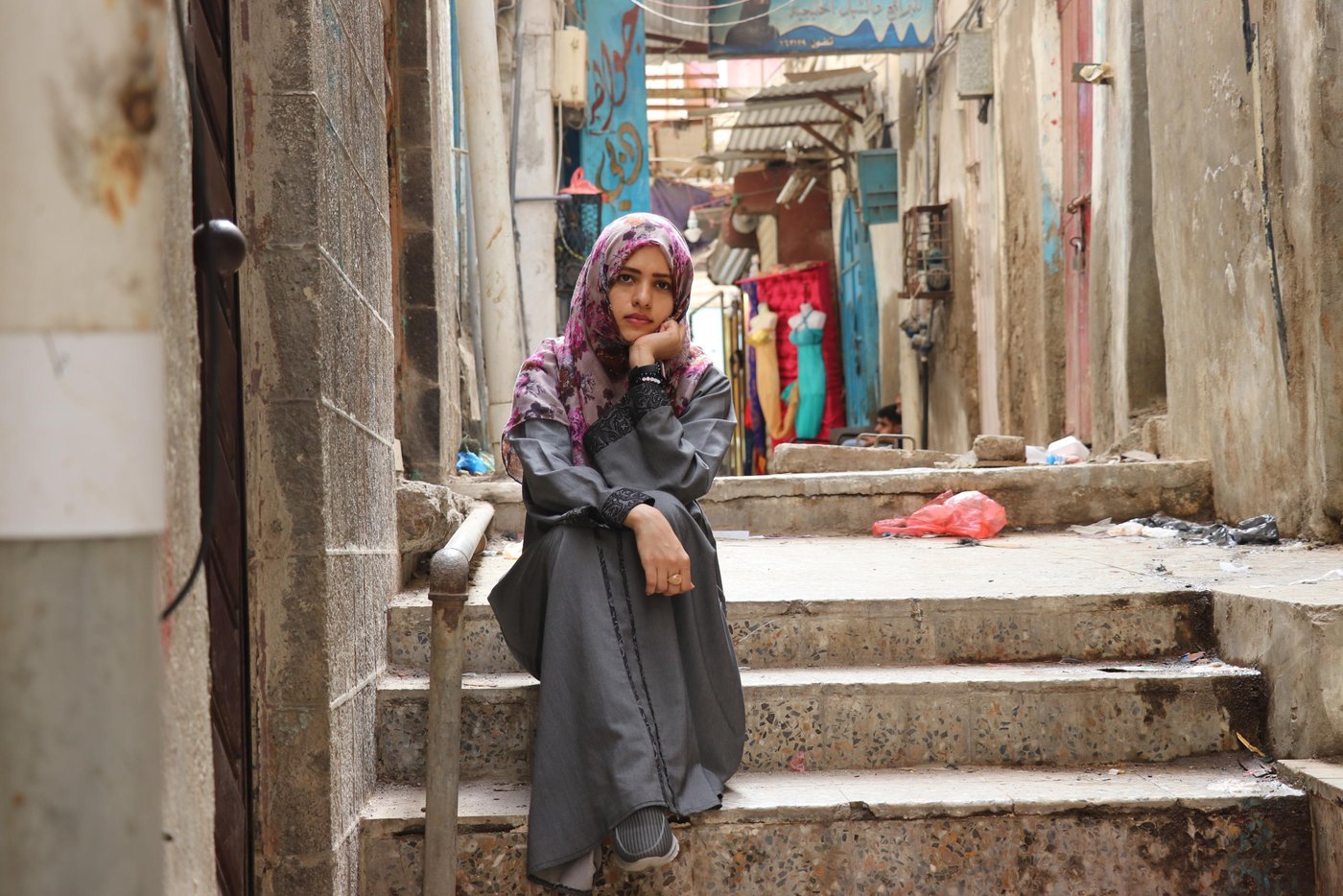 Nuhad Mubarak has been working with NRC as an Information Counselling and Legal Assistance (ICLA) officer since August 2018. She enjoys meeting the people we assist in the field, delivering awareness raising sessions and involvement in campaigns that draw attention to the importance of civil documentation.
Nuhad says that her work has taught her the importance of civil documentation, and the extent to which obstacles can be resolved through good team work and communication.
The massive needs she sees in Yemen motivates Nuhad and her team to do their best work. The context is highly insecure, and necessitates a lot of precautions. Nuhad said she is grateful for the work of NRC’s security team to keep them safe in their job.
On the 5th of May, 2015, Nuhad fled her own home because of shelling in the mountains not far away from where she lived. She says she can understand what IDPs are experiencing and worried about. She feels that nothing will ever replace the peaceful conditions they used to live in back in their homes, but all assistance provided to them is important for them to survive. She believes many humanitarian workers are heroes, but it is also those living in displacement who are the real heroes.
Nuhad says the person she most admired is her mother. A car accident in 2006 left her mother with disabilities until she passed away in 2012, but Nuhad remembers her as always supporting and encouraging Nuhad to move forward and make her dreams come true.
Although it hurts to see the destruction of her city and the ongoing impact of the conflict, Nuhad still sees hope in the people she assists through her work. In a highly unpredictable context, she says she tries to have a normal life, spending her spare time visiting relatives and hanging out with friends. She enjoys reading books and spends her nights reading until she falls asleep. Sometimes she goes shopping in Crater district where her house is.
Nuhad hopes that her country will recover soon. She dreams of a new Yemen where there’s no war, hunger or epidemics. She knows it might take time, but she believes there is hope.