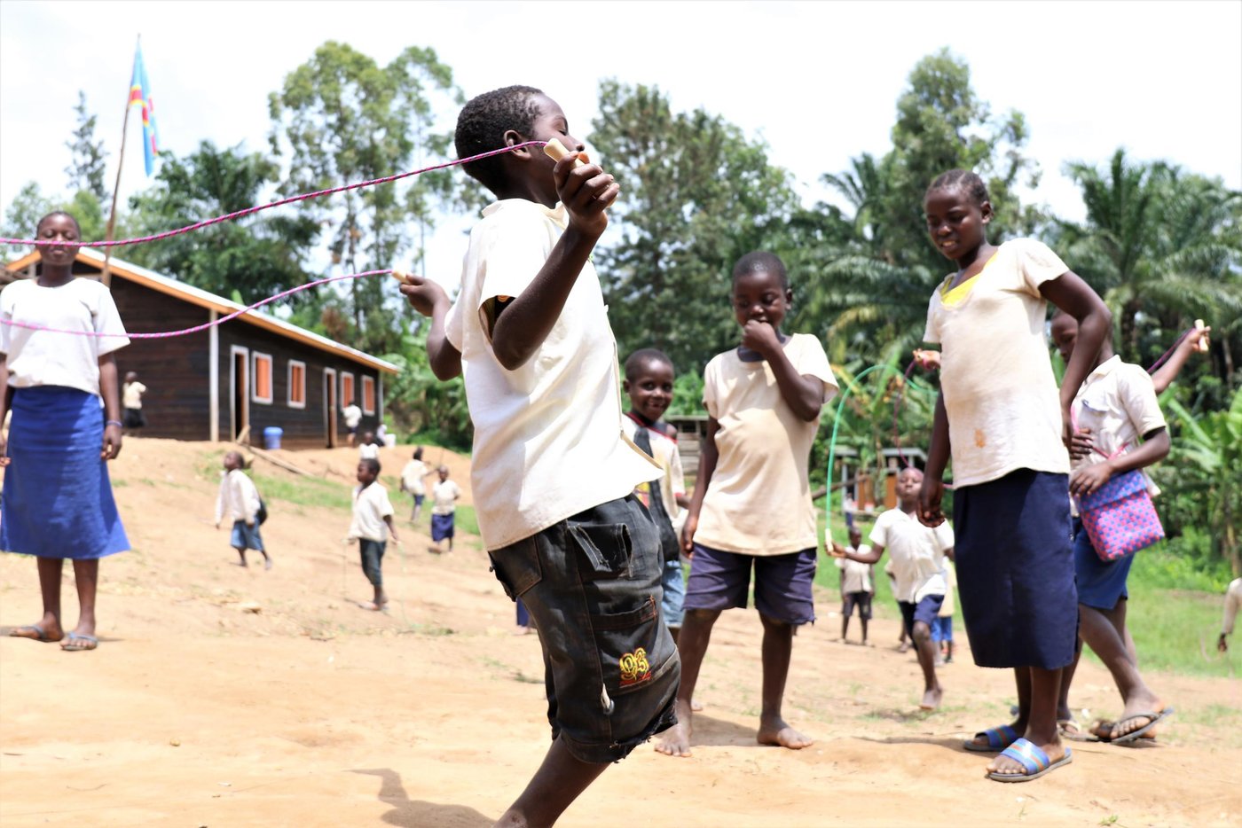 Bahati is fourteen-years-old and lives in Kasave village in Rutshuru territory, DR Congo.
When we met him, he was attending the five grade at Kihito primary school where NRC distributed notebooks, pens, pencils, and other school supplies to enable vulnerable crisis-affected children to afford better their education in a protected and secure environment.
In 2017, given the fact that his parents were unable to pay his school fees, Bahati dropped out of school for one year. During this time, he was feeling bad and bored to stay home alone while his friends and schoolmates were at school. When NRC selected him to participate in the catchup class, Bahati was very happy and motivated to go back to school again. Since he has attended NRC catch up class, Bahati is now very devoted to the French language in order to be able to communicate better with French speakers. Bahati would like to become a teacher so that he can teach others children. During the reaction time at Kihito primary school, he usually plays football and jumps rope with his schoolmates.
With support from the European Union Civil Protection and Humanitarian Aid (ECHO) and the Swedish International Development Cooperation Agency (Sida) NRC distributed notebooks, pens and pencils to over 13 200 students, including Bahati, to ensure that they study in a protected and safe environment. NRC also trained teachers of Psychosocial Support and Classroom Management to ensure quality education for the conflict-affected children, and trained Parent Teacher Committees on school management. In addition, we supported over 4 200 students with catch-up class to help them reintegrate into school where they will study for free this year thanks to cash transfers to the schools that contributed to teacher payment, purchase of school materials and other needs.
Thanks to this response, NRC built twenty-eight new classrooms in fourteen conflict-affected primary schools in Rutshuru; these classrooms are currently hosting the children from the local community, returnees and displaced children— thus, numbers of students enrolled have doubled and the schooling conditions have improved significantly compared to last year.
November 2018
Photo: NRC/Ephrem Chiruza