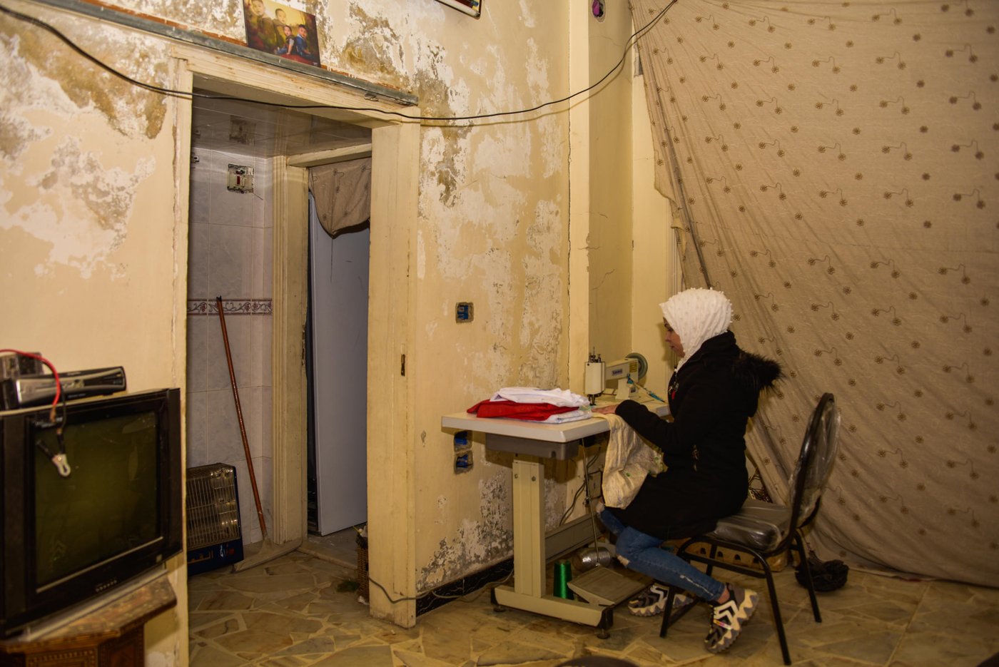 Woman working with her much-loved sewing machine.