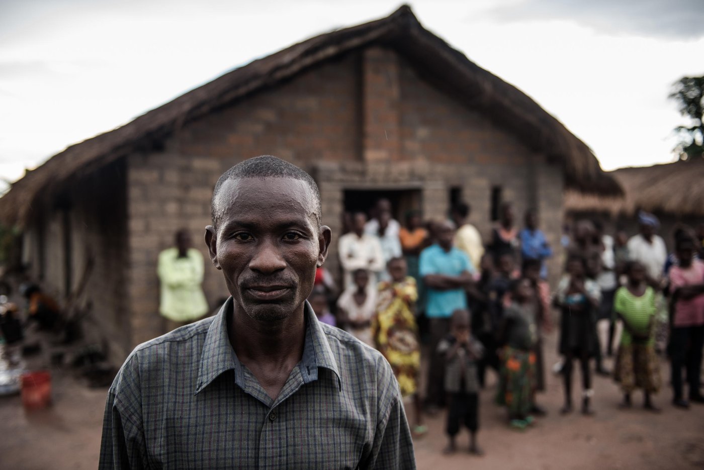 Pastor Mbuyu (43) is looking after displaced people, Nyunzu
What does he want the world to know?
“I’m pleading for humanitarian aid for all the displaced in Nyunzu. They need assistance.”
Never before in the violent history of DR Congo have more people been displaced than in 2017.
DR Congo is experiencing one of the world's most critical and complicated humanitarian crises. By the end of 2017, a total of 4.5 million Congolese were internally displaced, and more than 685,000 had fled to neighbouring countries.
Violence, diseases, malnourishment and displacement characterise the lives of ordinary people in large parts of the country. Schools have been destroyed and women and children are at risk of abuse. Displaced people, 60 per cent of them children, have large, unaddressed needs for protection, healthcare and education.
A total of 8.9 million people lack access to food and clean drinking water. 2.2 million children are acutely malnourished. Health stations need rebuilding, cholera outbreaks are reoccuring and child soldiers continue to be recruited by armed groups.
A neglected crisis
Despite DR Congo and Syria having the same number of people in need, media attention on the former has been scarce. 2017 was no exception. The population of DR Congo has seen violent conflict for decades, and international attention is decreasing.
In October 2017, the UN declared the violent conflict an L3 crisis, UN’s highest level of emergency, on par with the emergencies in Syria, Iraq and Yemen. This implied that the humanitarian system would need to step up the preparedness and respond quickly to cover the enormous need for emergency relief. Despite this important move, the necessary funding was not provided. International donors only contributed with a little more than half the amount that the UN and aid organisations considered necessary to cover the humanitarian needs.
Despite increasing humanitarian needs, the number of aid organisations has decreased in several provinces. In North Kivu, the number of organizations has gone down by half, even though one-in-four internally displaced people reside in this province.
In 2018, the UN launched its largest humanitarian appeal so far, for DR Congo. It amounts to US $1.680 billion and will cover the needs of 10.5 million people. To be able to meet the appeal, the international community will have to quadruple its efforts compared to 2017. The lack of funding is very serious and without an immediate response, many human lives will be lost.
Many and complicated conflicts
People are forced to flee due to a range of armed groups fighting each other and the state. The conflicts in DR Congo are fuelled by ethnic rivalries, the struggle over natural resources and lack of government control. The armed groups range from small groups of armed bandits to larger guerrilla groups with centralised structures.
Throughout 2017, new conflicts emerged in the Greater Kasai region, previously untouched by armed clashes. In the province of Tanganyika, long-simmering inter-ethnic tensions boiled over. In addition to these newer hotspots, older conflicts re-emerged and escalated in North Kivu and Ituri provinces, in the eastern parts of the country.
The humanitarian crisis in DR Congo is expected to worsen and will likely spread further across the Great Lakes region.
PHOTO CAPTION:
On the outskirts of Nyunzu village in eastern Congo, stands a small thatched roof church. Vumi is just one of a hundred men, women and children huddle together inside, sheltering from torrential monsoon rains. Families live on top of each other in appalling squalor. The raw coughs of children are muffled by the rain spitting through the roof. They sleep rough on wet soil, thinly covered by empty sacks of sugar.
Four people have died since the group fled to this church for safety in September, including two children. This scene is replicated in countless churches across Congo, as a little known conflict is tearing the central African nation apart.
Pastor Mbuyu (43) is looking after this group of displaced people.
“It’s only the grace of God that I find money to help them. Often I don’t have enough to send my own children to school because of what I give to the families in the church. I work in my own fields, and in other people’s fields to earn money for the families.
“I just said to them stay here. I no longer have church services here, I’d rather the people would just stay that need it.”
What does he want the world to know?
“I’m pleading for humanitarian aid for all the displaced in Nyunzu. They need assistance.”
An upsurge in violence in several parts of DR Congo in 2015, has left over 1.7 million people to flee their homes this year alone; that’s over 5,500 people per day. This week the DR Congo was declared the worst affected by displacement in the world by the global analysts, IDMC. Tanganyika province, is one of the hotspots of the current crisis.
Despite the UN putting the world on notice about Congo’s crisis, little has changed since October. Money has only trickled in to help the 13 million people in need. Today the country is the second lowest funded of the world’s largest crises - less than half of the US$812 million aid appeal is funded.
The violence has prevented many families from accessing land and maintaining their livelihoods. 7.7 million people are severely food insecure, up 30 per cent in a year. Lack of access to clean water has led to a cholera outbreak that has killed some 600 people.
Photos: NRC/Christian Jepsen
Date: 1 December 2017