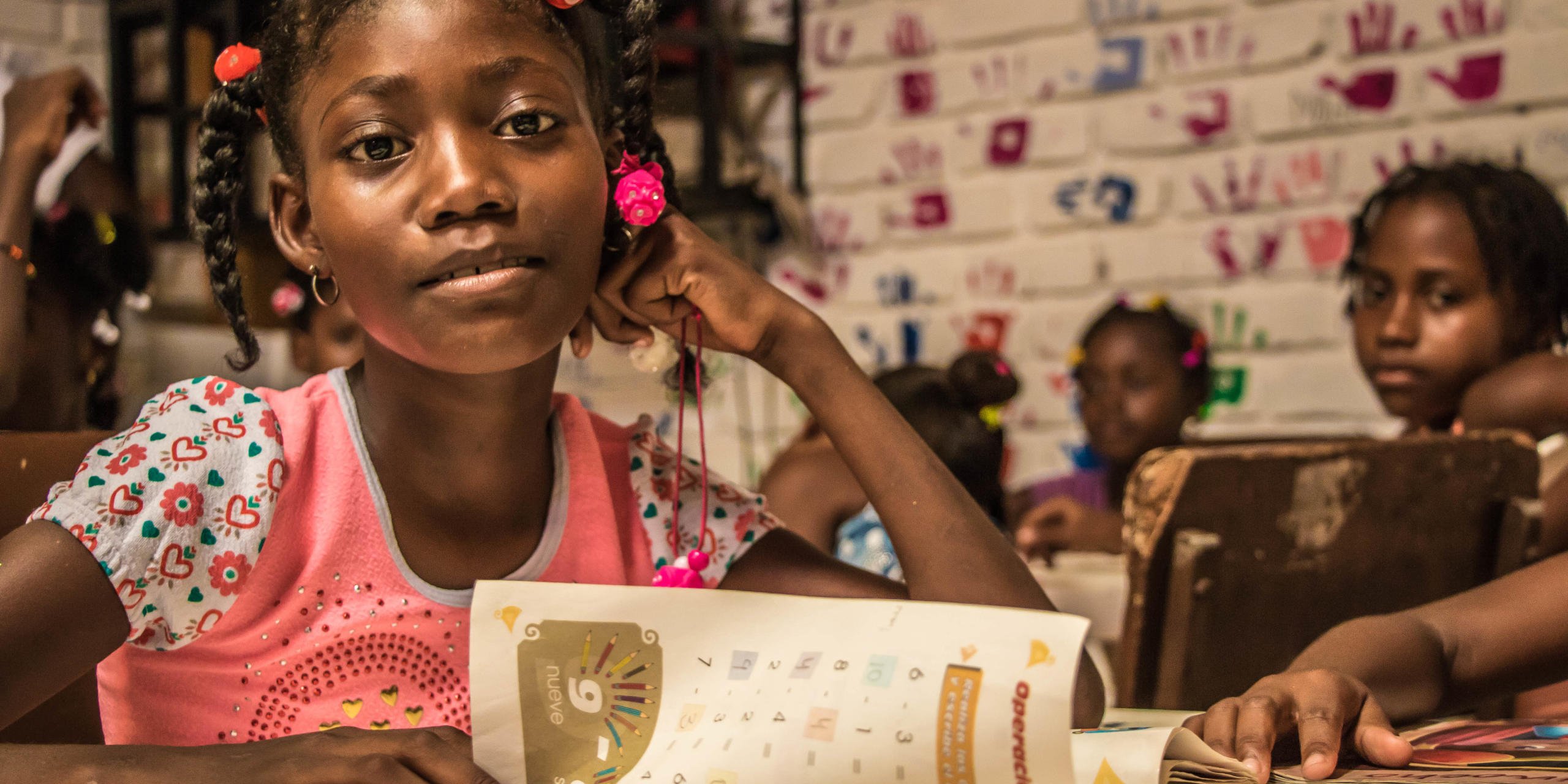 Panama neighborhood has one of the most high concetration of displaced population in Tumaco. Displaced children arrive without the oportunity of access education and face the risk of being recruited by criminal groups in the area or of suffering sexual violence, specially girls.

NRC has worked with the community for bringing back the education to the life of displaced children. The whole community, including parents and volunteer teachers work with NRC in the promotion of  protective spaces for education and in activities during the spare time - when the risk increases -.

Colombia, Nariño, Tumaco
2016

Photo by Edgar León