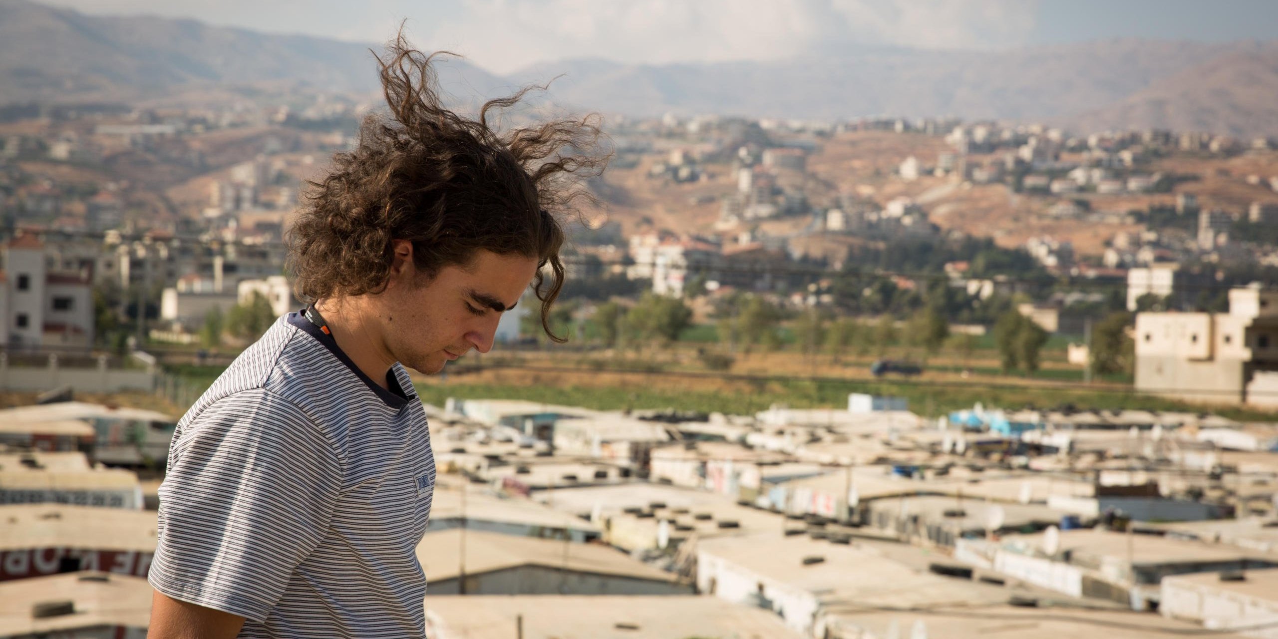 Marlon Langeland looking over one of the Informal Tented Settlements in Saadnayel in the Bekaa valley in Lebanon that is housing Syrian refugees.
Photo: Ingebjørg Kårstad/NRC.